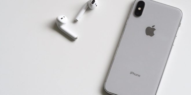 silver iphone x with airpods